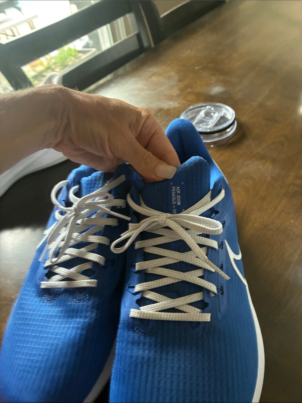 Nike Blue Running Shoes with White Swoosh